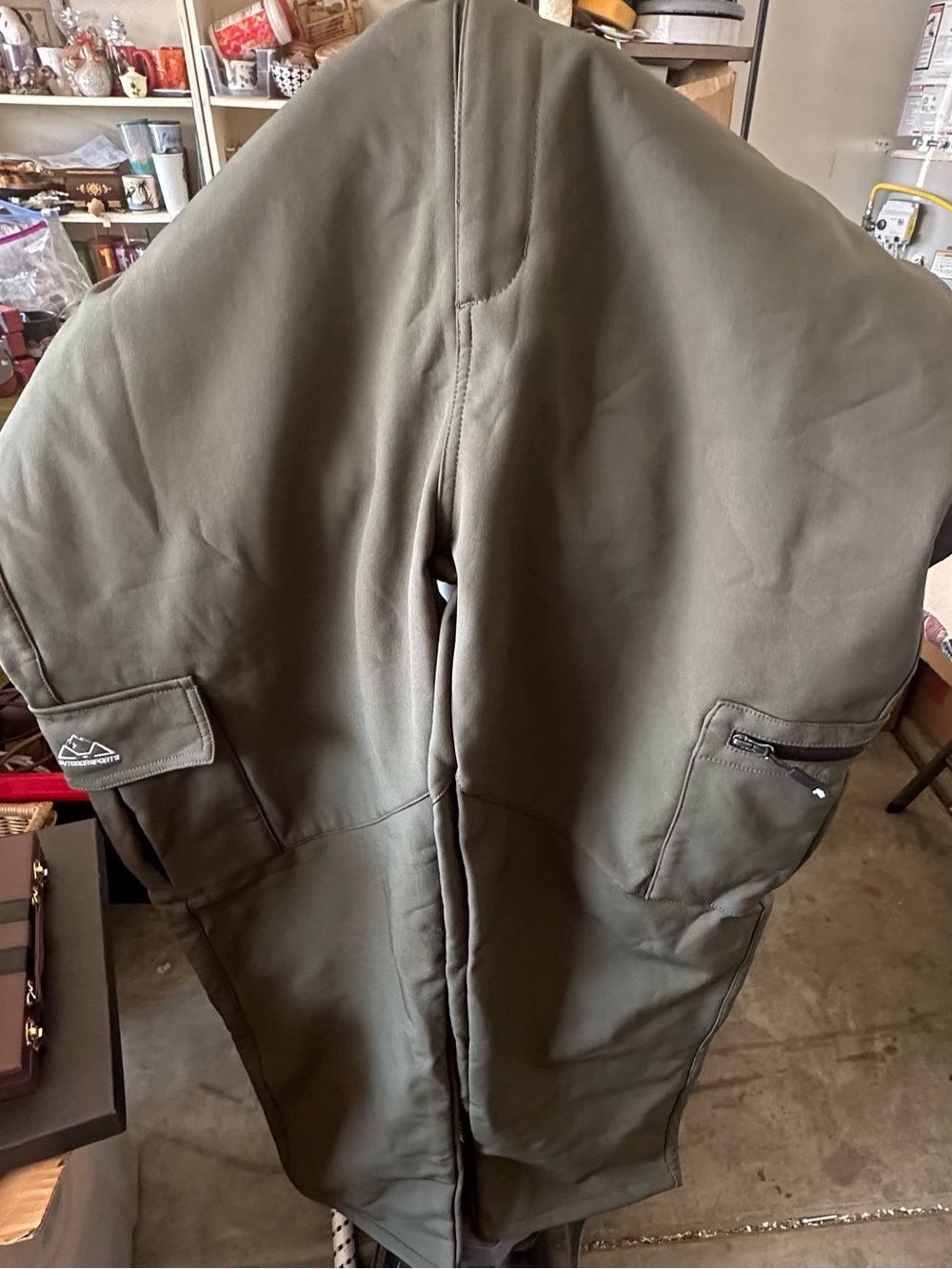 Outdoor Sports olive green fleece-lined cargo pants featuring utility pockets an